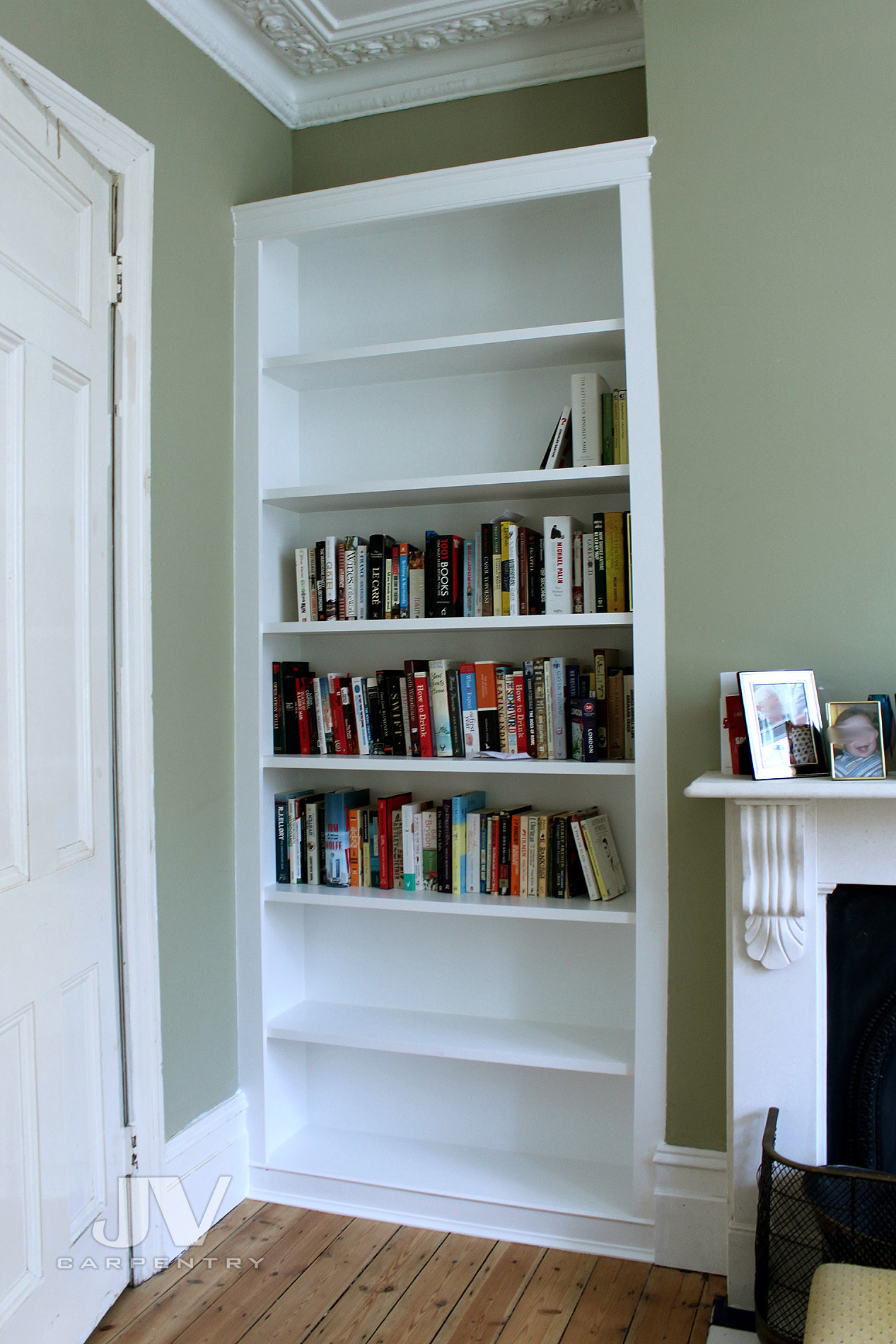 shelving alcove unit with shelves from top to bottom