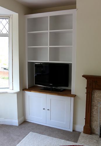 Living room fitted alcove with  oak top (LHS)