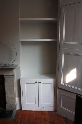 alcove cabinet and floating shelf