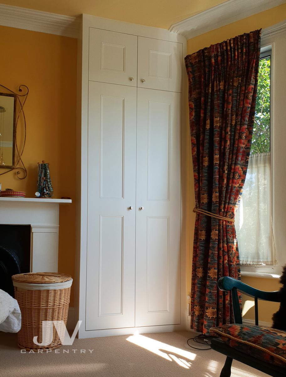 Alcove wardrobe at the right alcove, wardrobe matching original design of the bedroom.