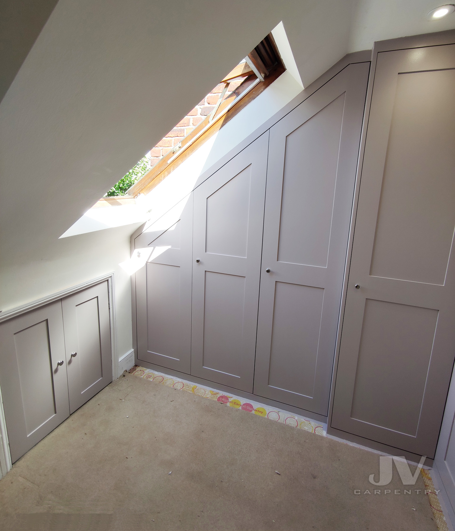 L-shaped fitted wardrobes in the Loft