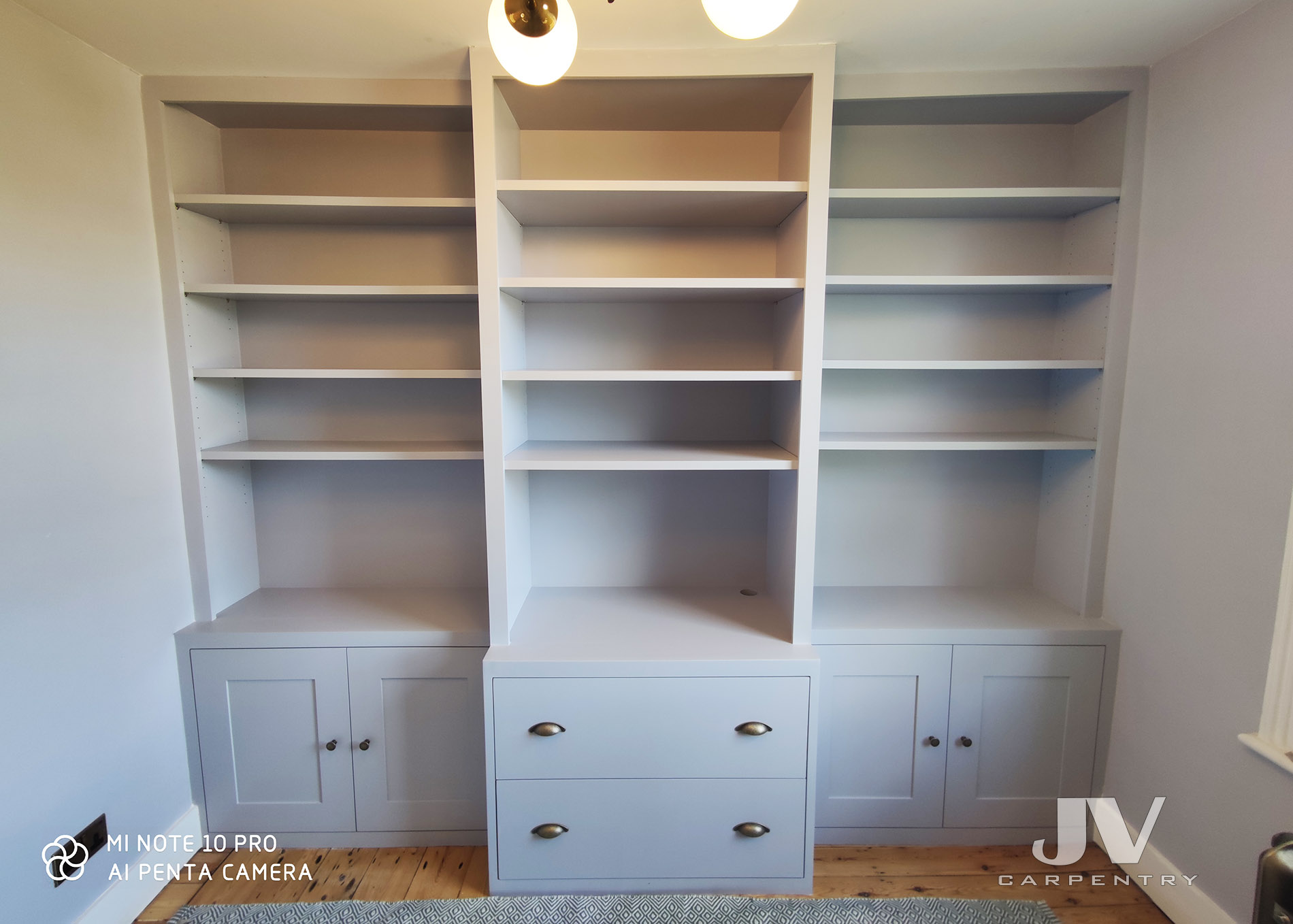 Bespoke fitted bookcase with drawers