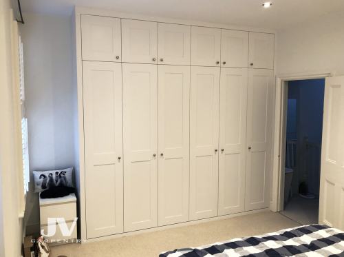 built-in-wardrobe-in-bedroom-6-doors