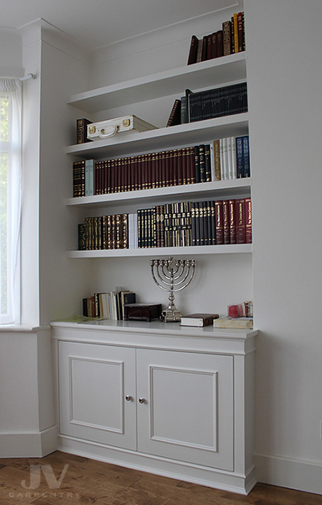 Alcove fitted bookshelves with cabinet at the bottom. Alcove cupboard good ideas