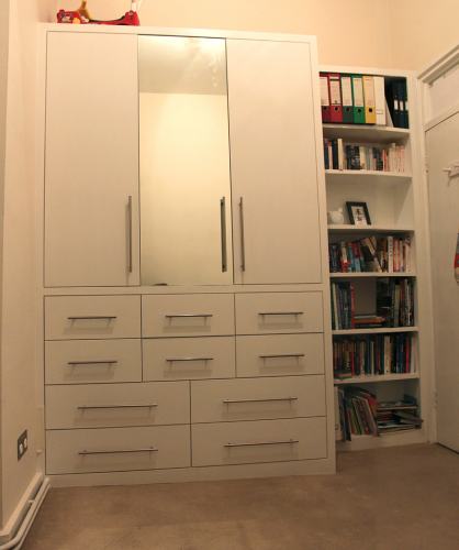 fitted wardrobe with bookcase