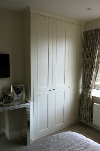fitted wardrobe with three shaker beaded doors