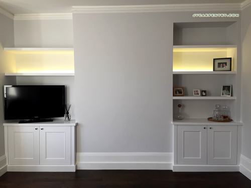Two alcove bookshelves with lights