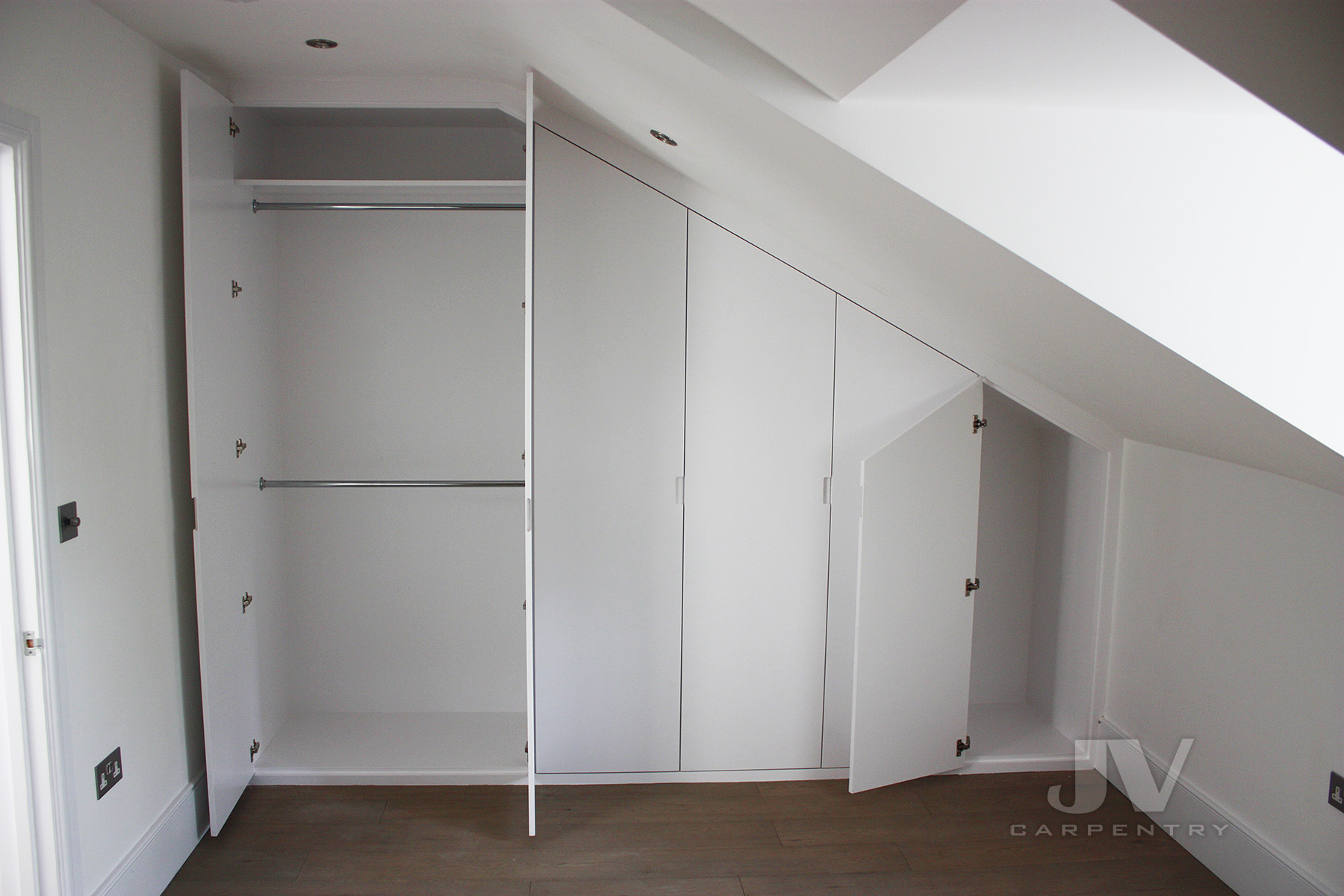 loft fitted wardrobe interior
