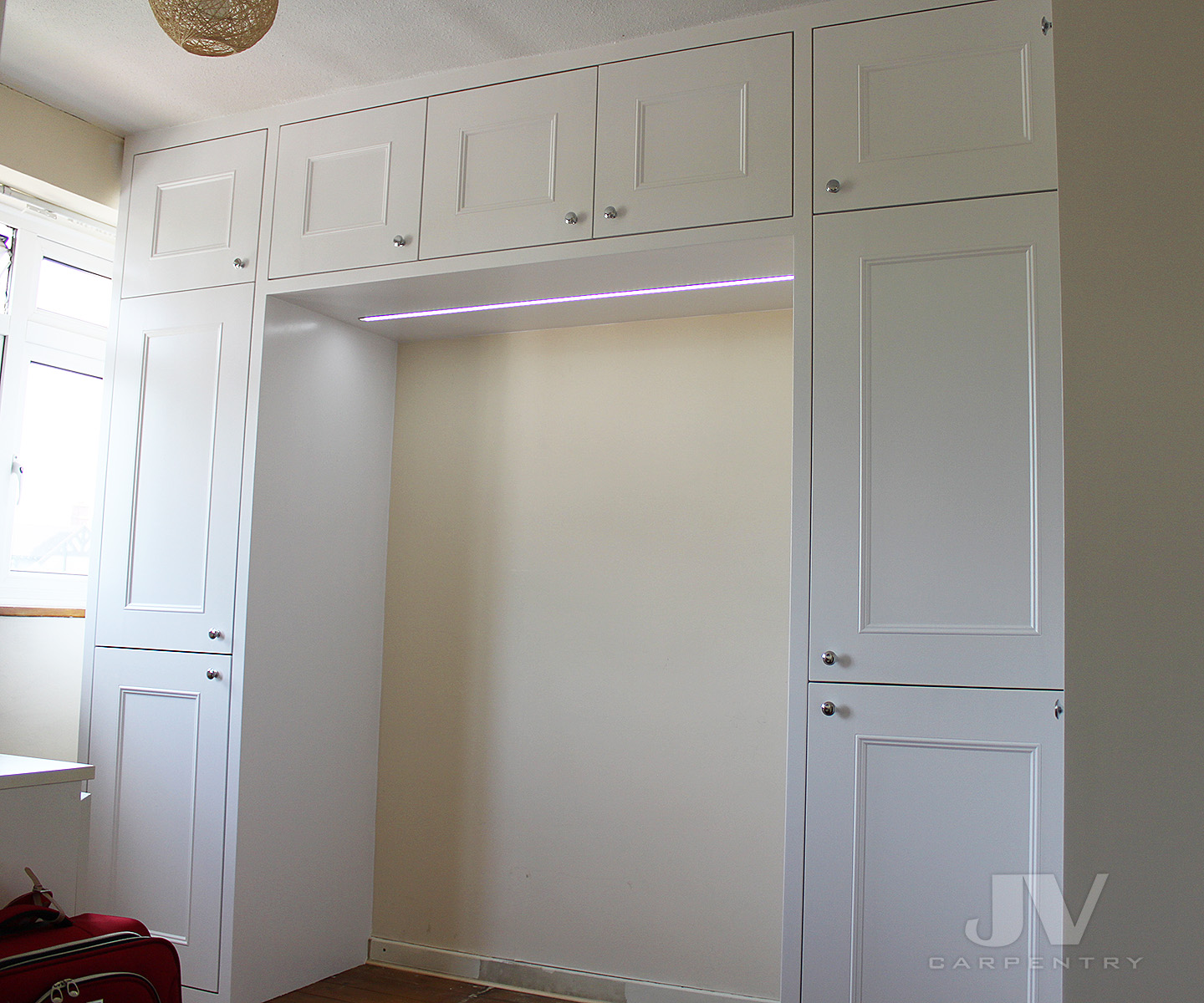 overbed fitted wardrobe