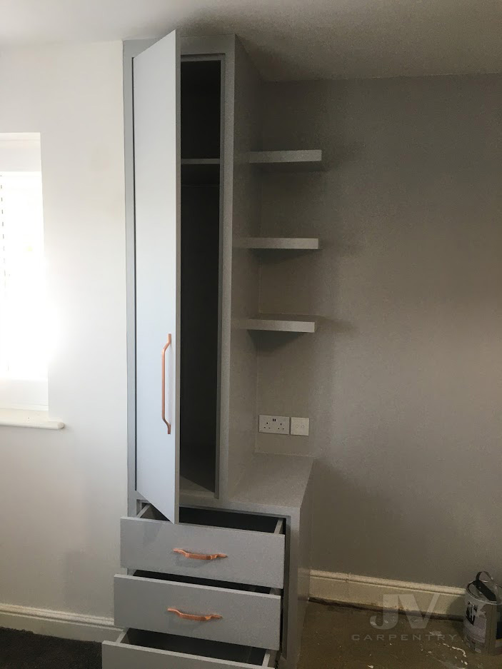 wardrobe with bed side table painting