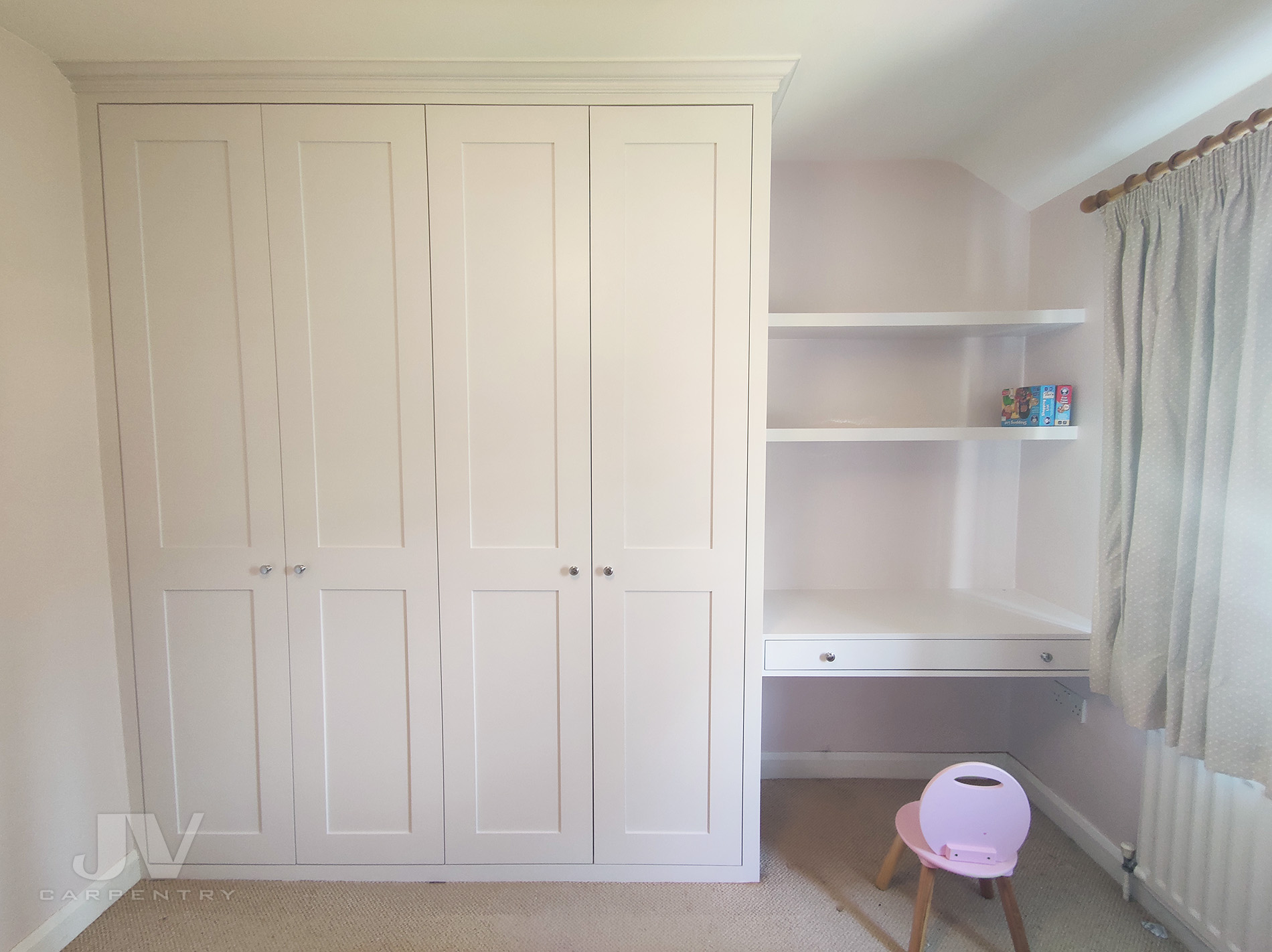 Built-in wardrobe with dressing table and shelves in Camden town