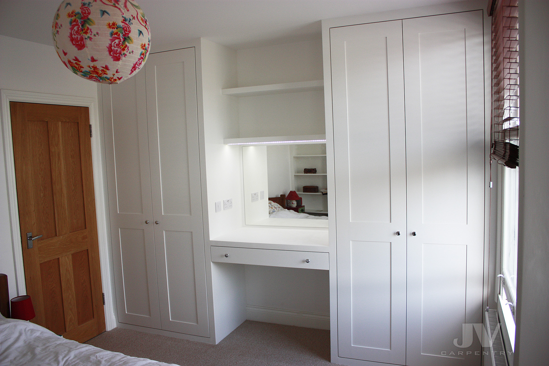 Two fitted wardrobes with dressing table