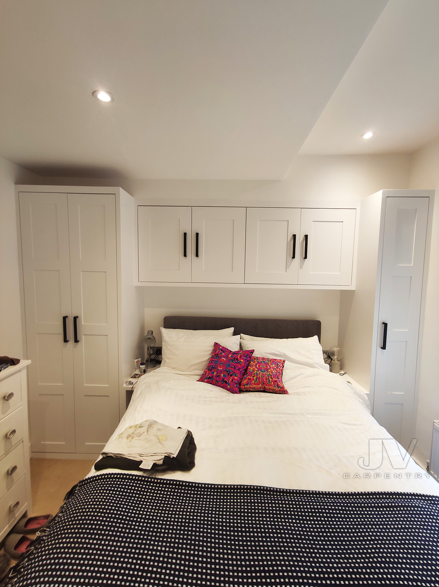 wardrobe with over the bed cupboards