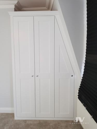alcove wardrobe with sloping ceiling