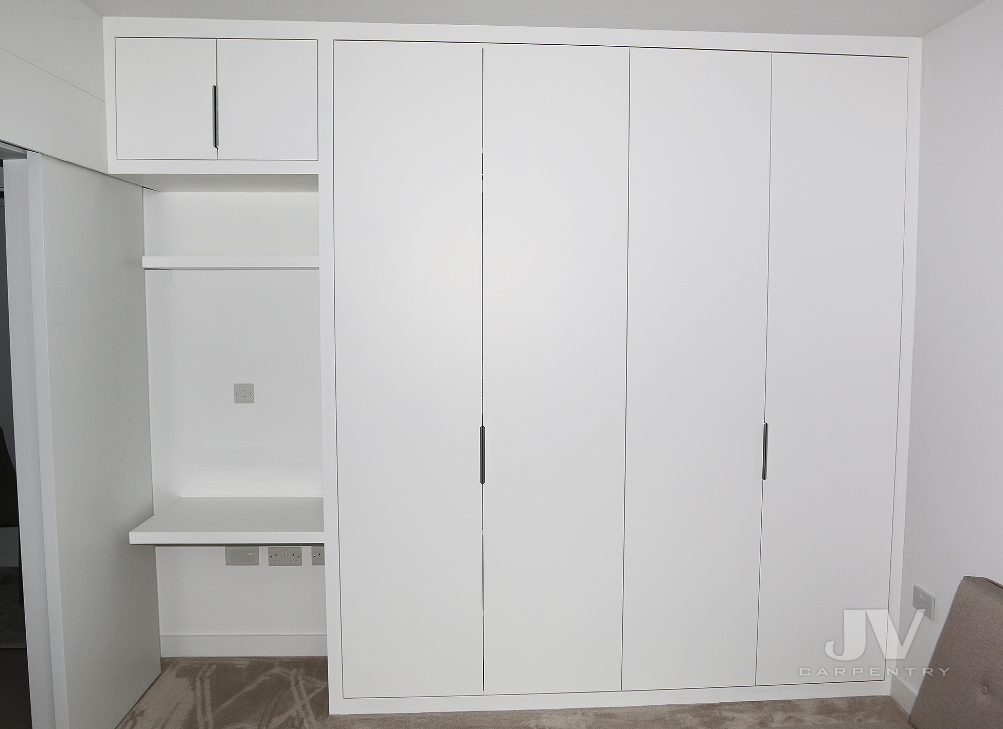 white fitted wardrobe with dressing table
