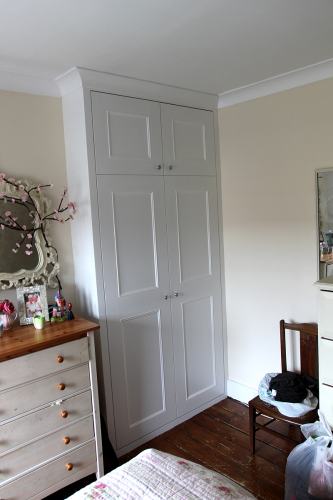 Bespoke alcove Wardrobe with coving to match existing