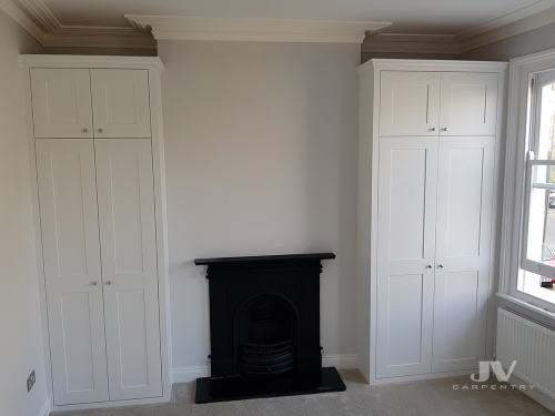 Traditional built-in wardrobes fitted into an alcoves